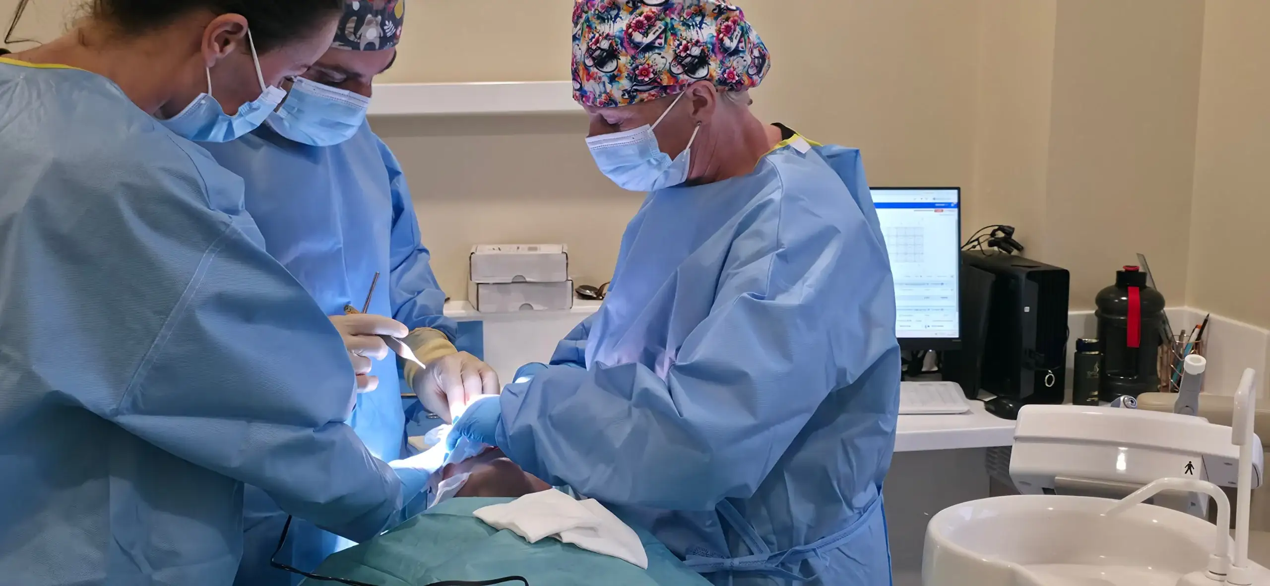 Surgical team performing reconstructive surgery in theatre